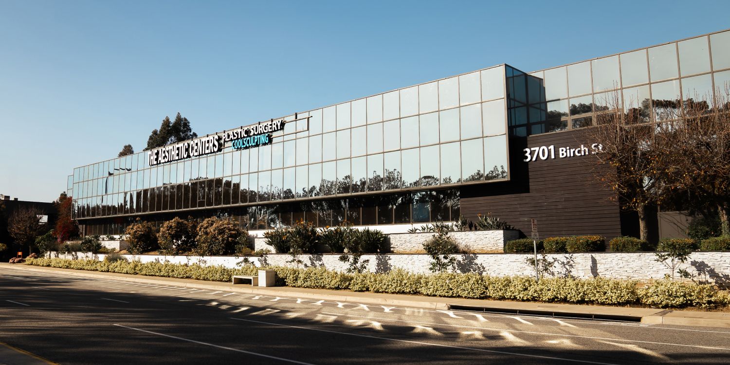 Modern medical building exterior with landscaping.